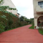 ToulasApartmentsCorfu - Main entrance to garden and parking