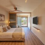 BlueSeaBeachMelia - 13.MAIN PHOTO OF FAMILY SLIDING DOOR GARDEN VIEW 3