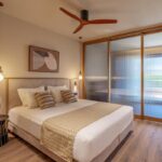 BlueSeaBeachMelia - 15.FAMILY SLIDING DOOR GARDEN VIEW 1