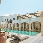 GrecotelPlaza - 03 Z100_The lovely pool promenade_72dpi