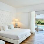 GrecotelWhitePalace - 029 W room example swim up white room_90648005