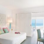 GrecotelWhitePalace - 46 Petit Yali Seafront Suite with Sharing infinity Pool_72dpi
