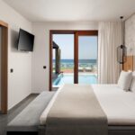 IkarosBeach - 036 W room example suite premier seafront view junior suite seafront private pool_93371611