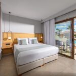 StellaPalace - 066 W room example suite deluxe pool view family suite sharing pool_132543522 Copy