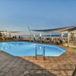 SunsetBeachHotel - Sunset beach hotel pool area